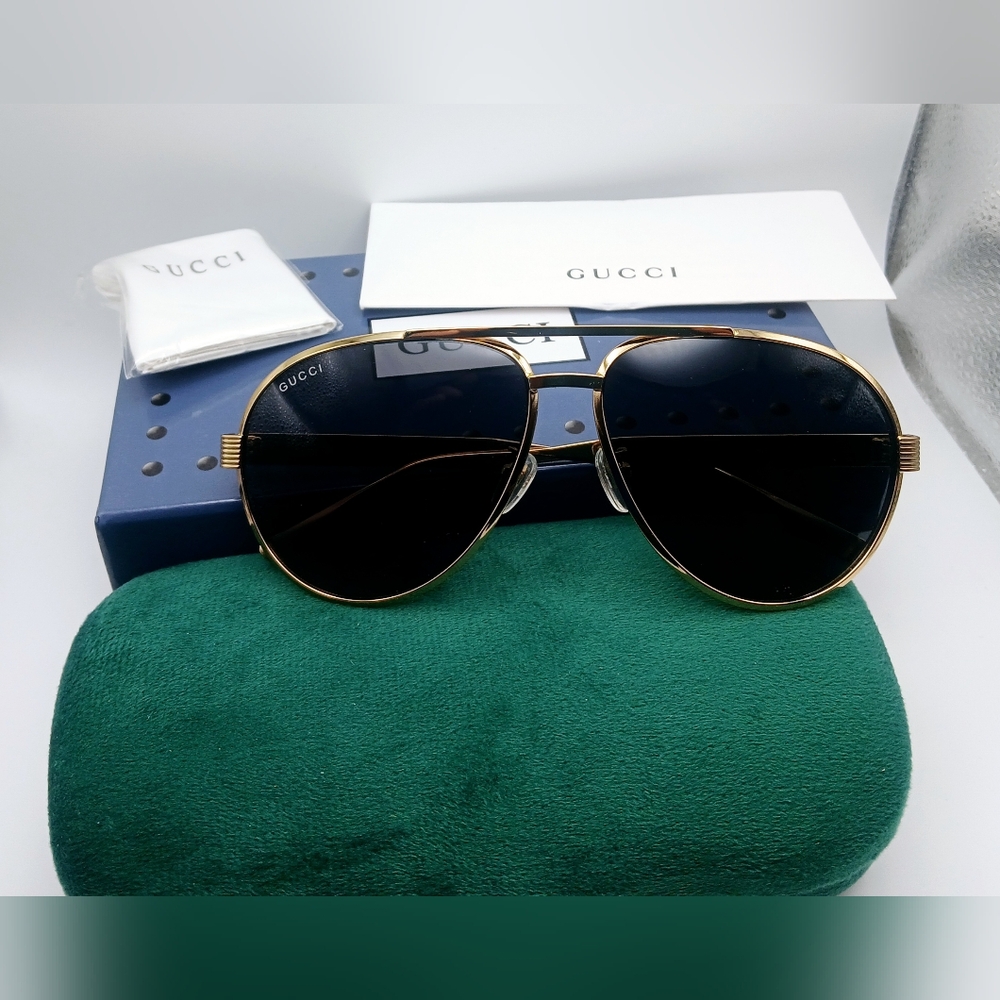 Gucci gold frame sunglasses. Model # GG1513S